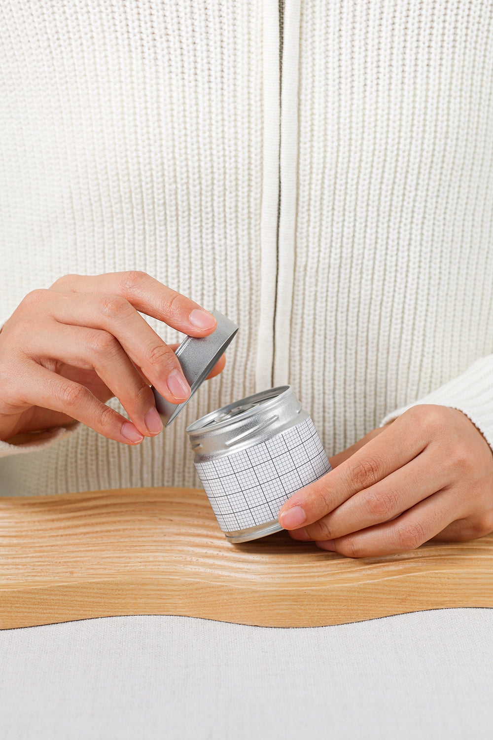 matcha tin container mockup with removable lid, clean and modern packaging scene