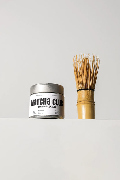 matcha tin can mockup with bamboo whisk, minimal product display on clean background