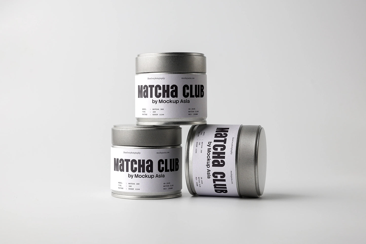 matcha packaging mockup with multiple tin cans, clean minimal branding setup