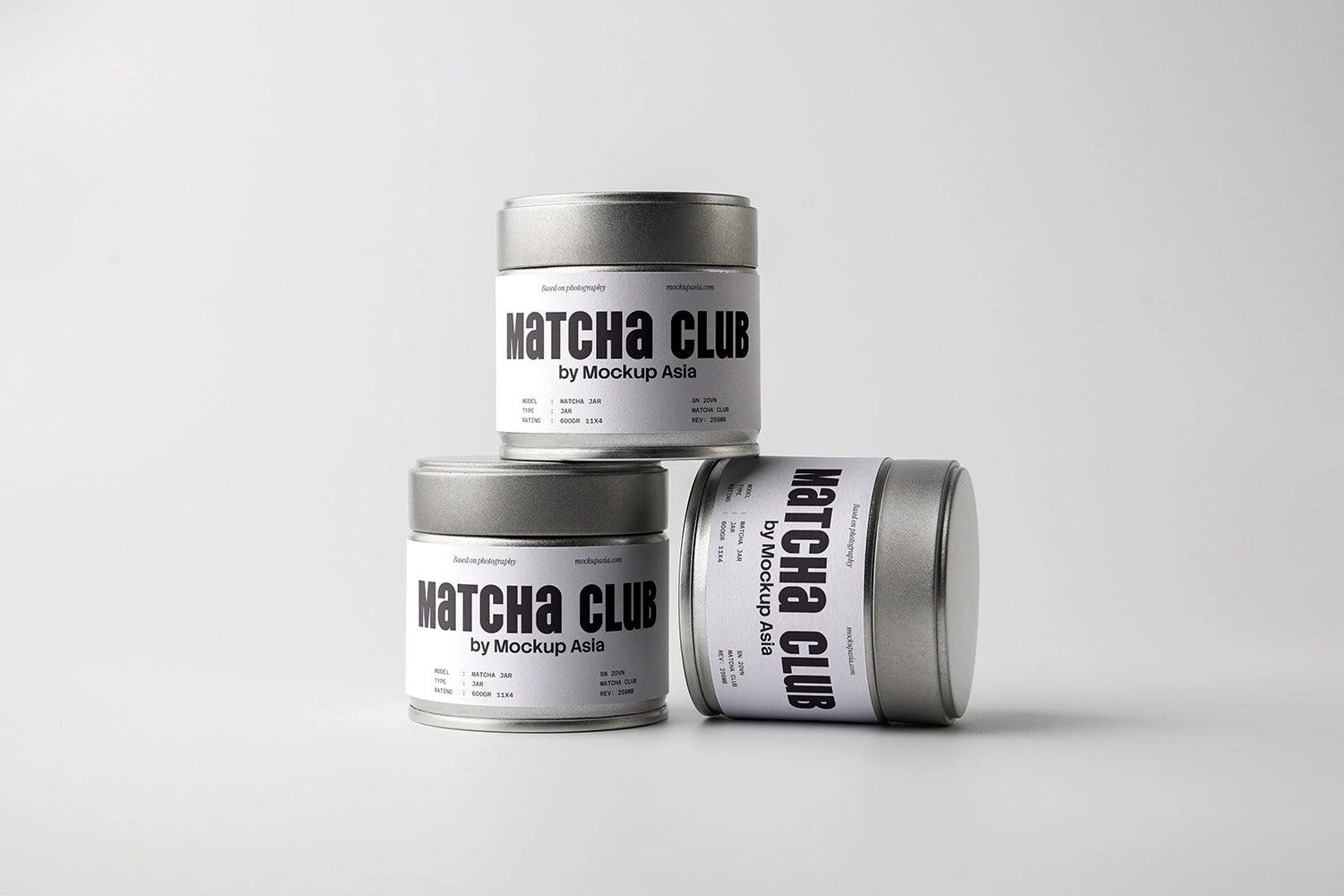 matcha packaging mockup with multiple tin cans, clean minimal branding setup