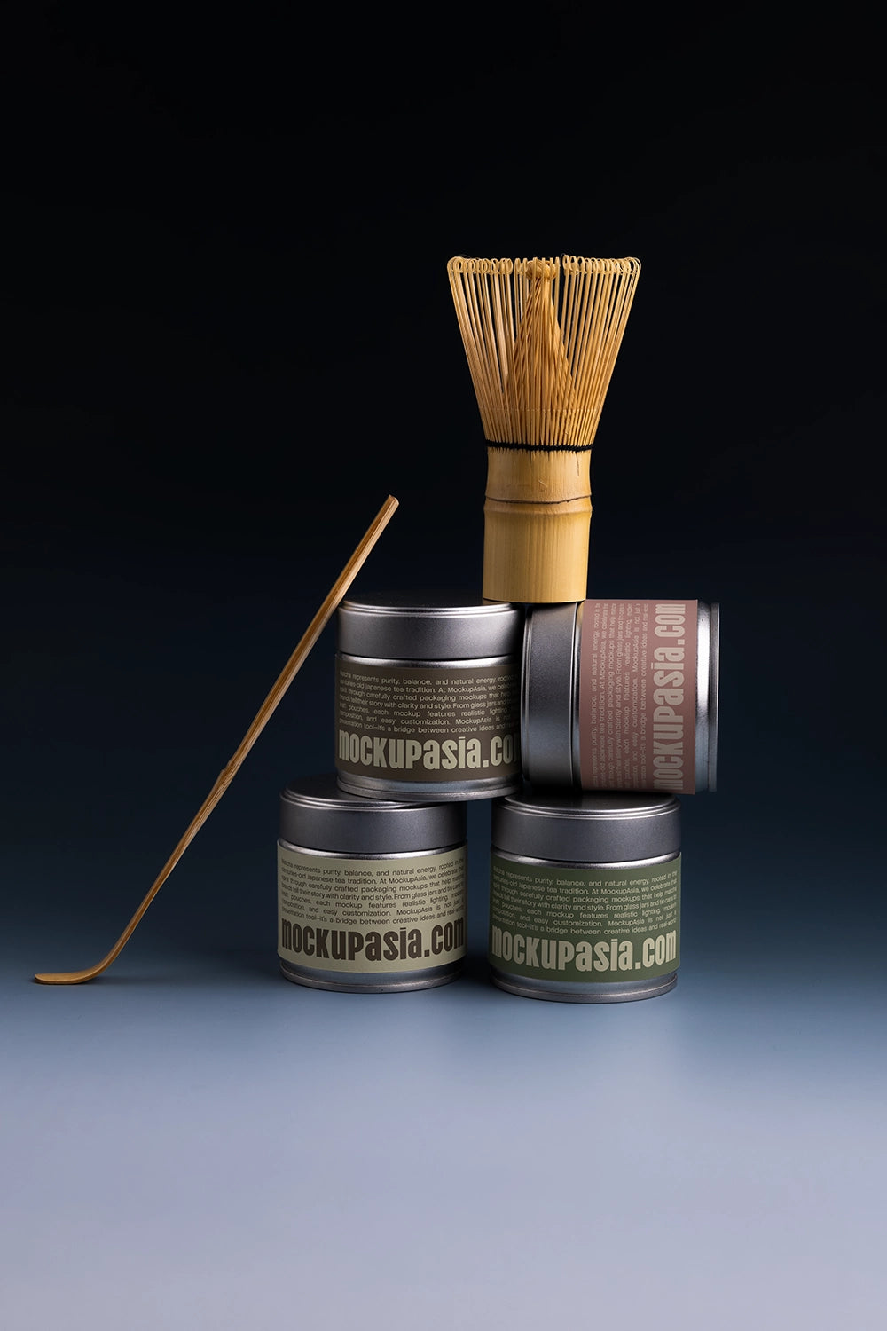 matcha packaging tin mockup set with creative stacked layout and tea tools, dramatic lighting