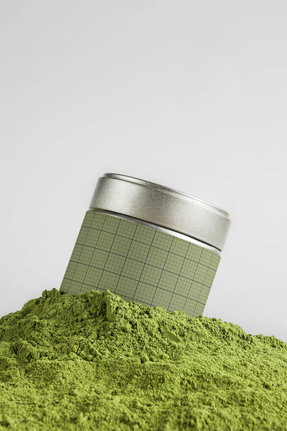 matcha tin can mockup surrounded by powder, modern product branding and natural texture