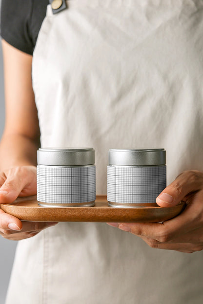 matcha tin can mockup duo on wooden tray, lifestyle branding and minimal aesthetic setup