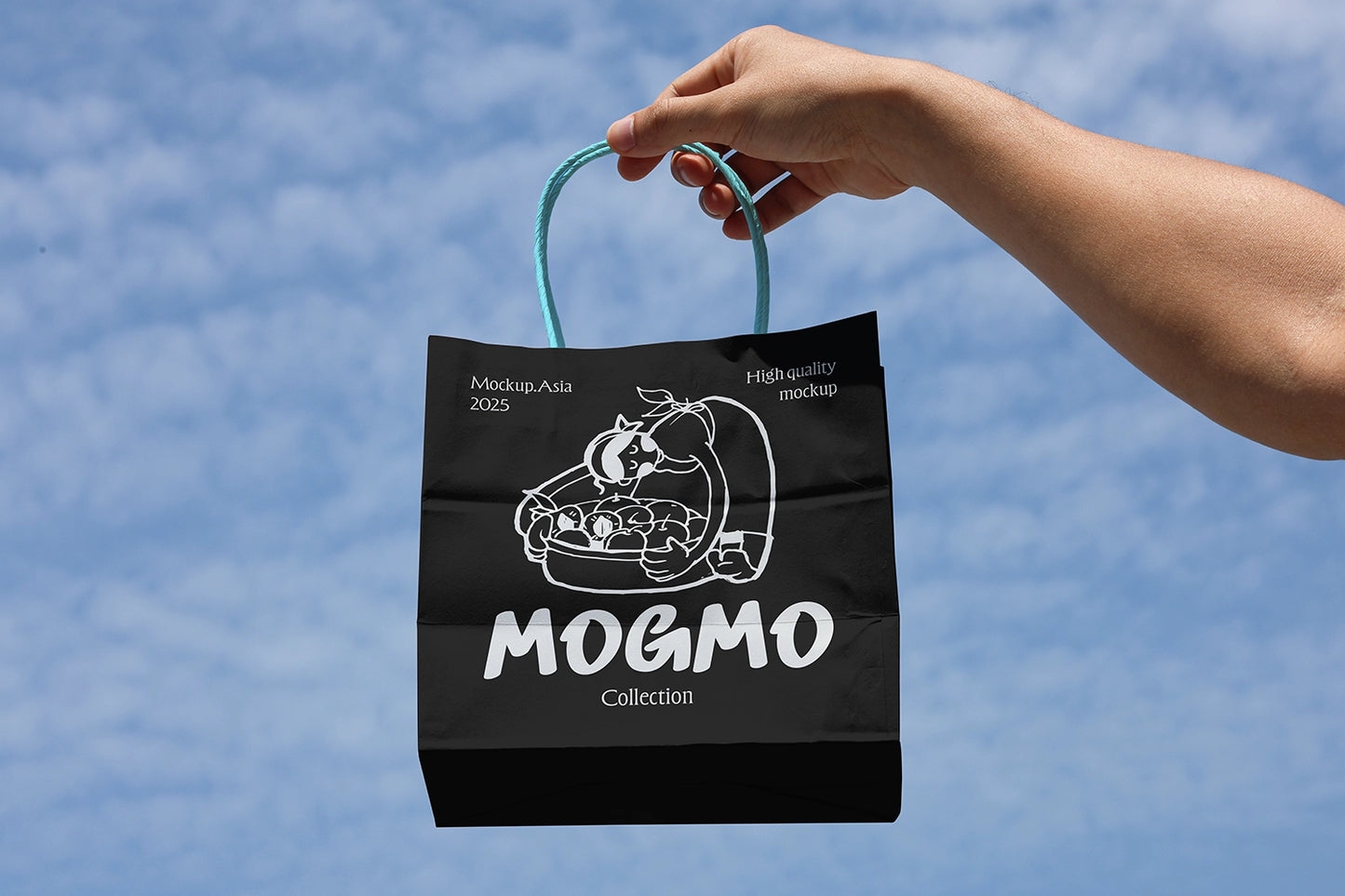 realistic shopping bag mockup in hand with sky background and soft daylight packaging presentation