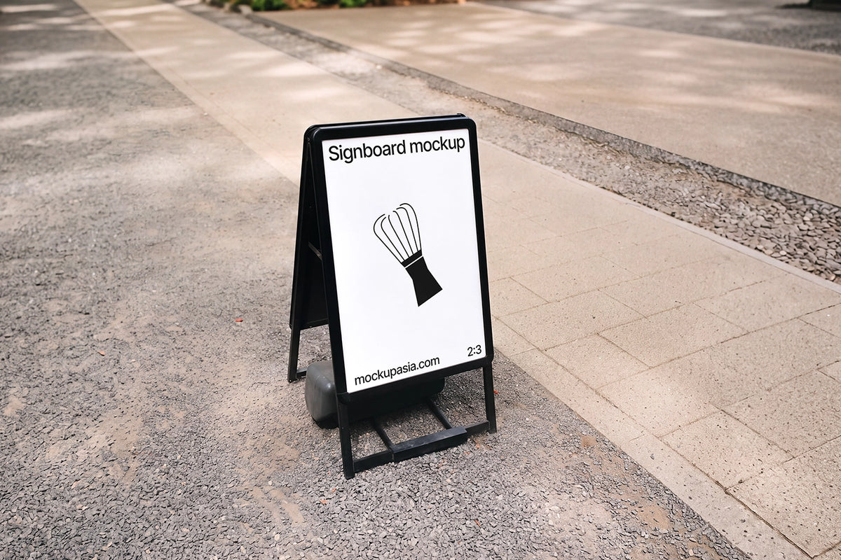 A-frame sidewalk sign mockup PSD on stone walkway