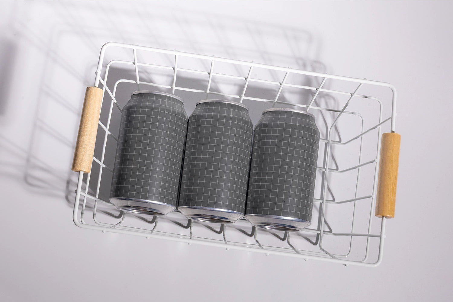 Aluminum soda can mockup set in basket overhead composition realistic packaging presentation PSD