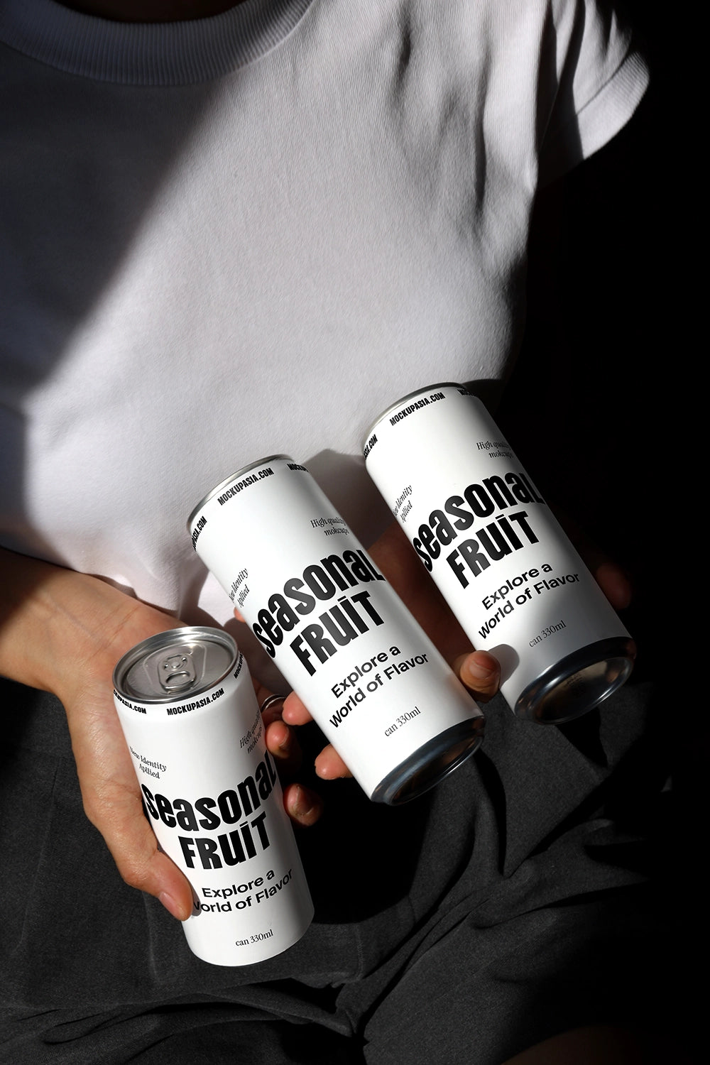 soda can mockup with three cans held together lifestyle scene