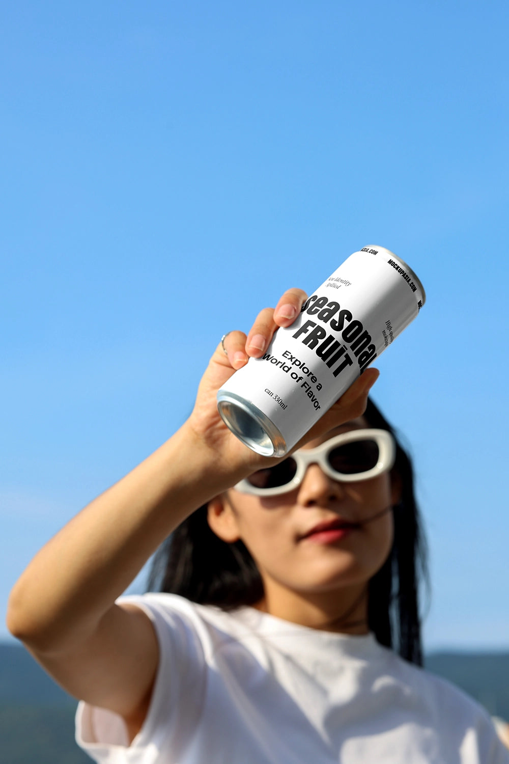 soda can mockup low angle hero shot outdoor branding scene