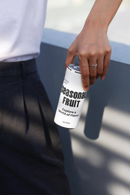soda can mockup held downward with shadow lighting scene