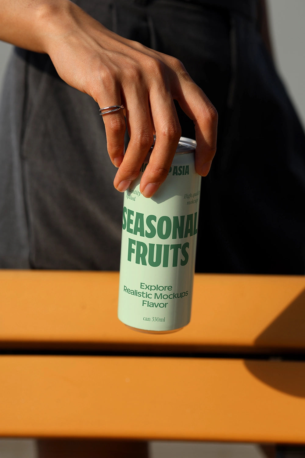 Aluminum beverage can mockup with simple handheld composition for soda and energy drink branding