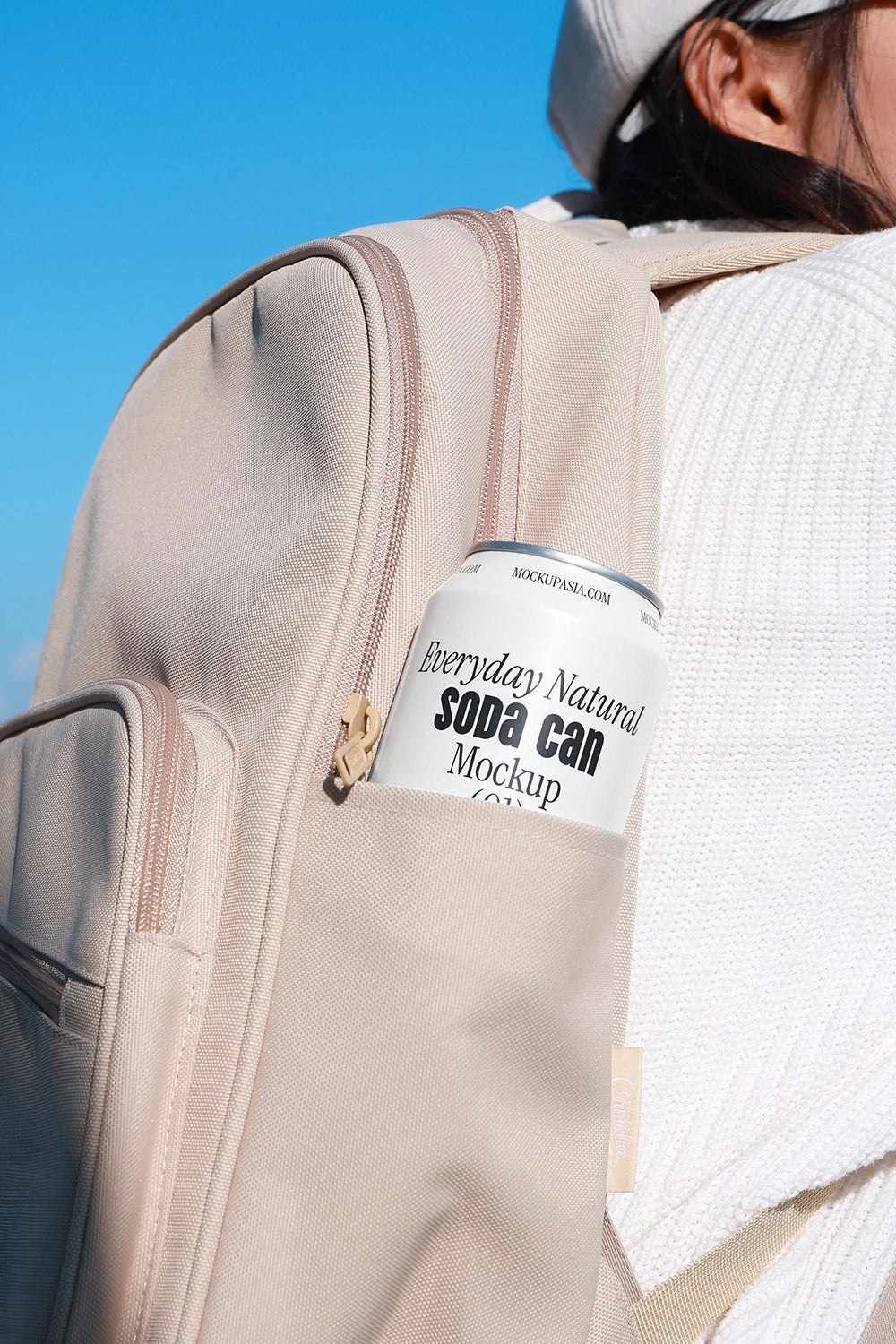 Soda can mockup in backpack pocket outdoor lifestyle aluminum beverage packaging natural scene