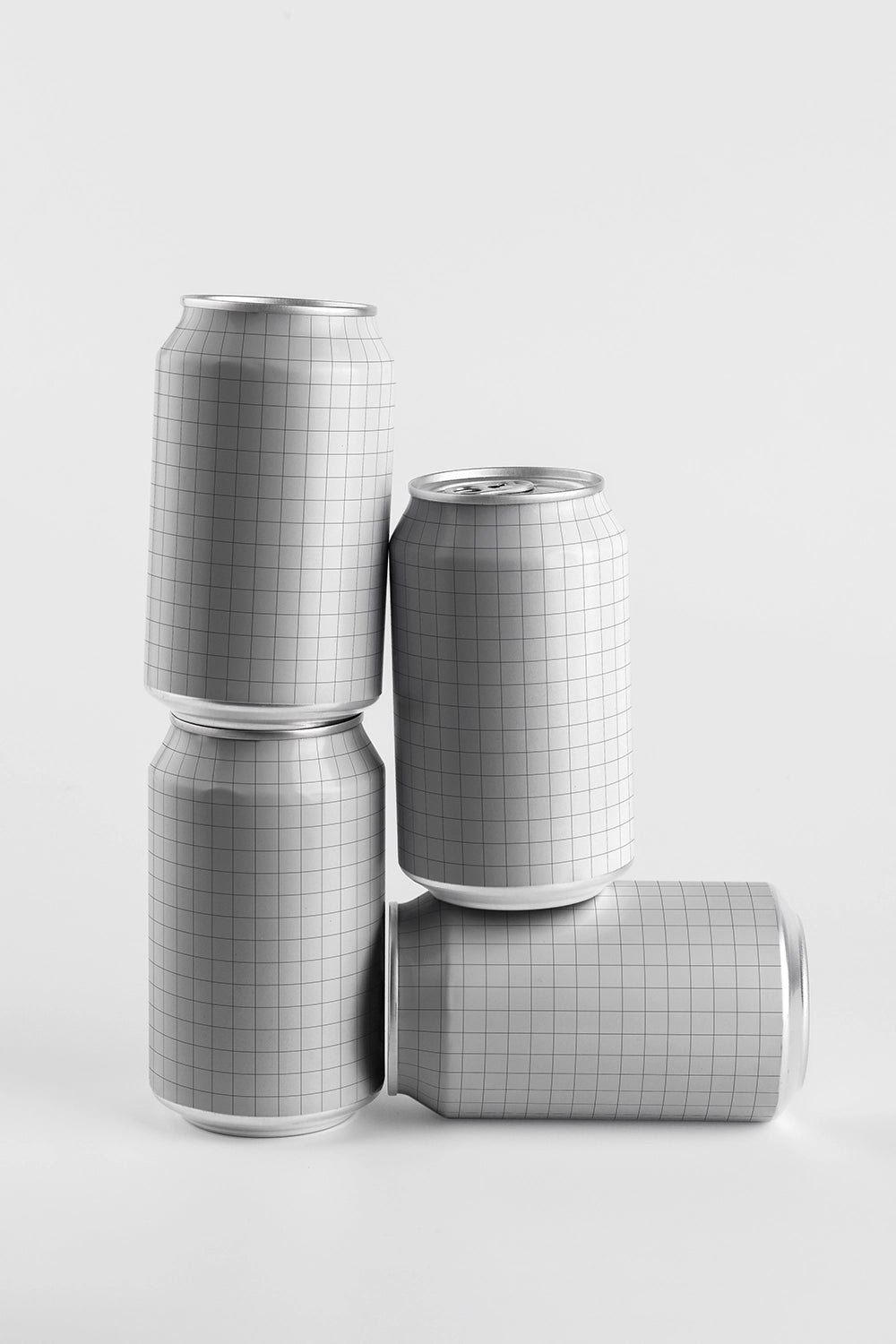 Aluminum can mockup collection four cans dynamic composition standing stacked and lying PSD template